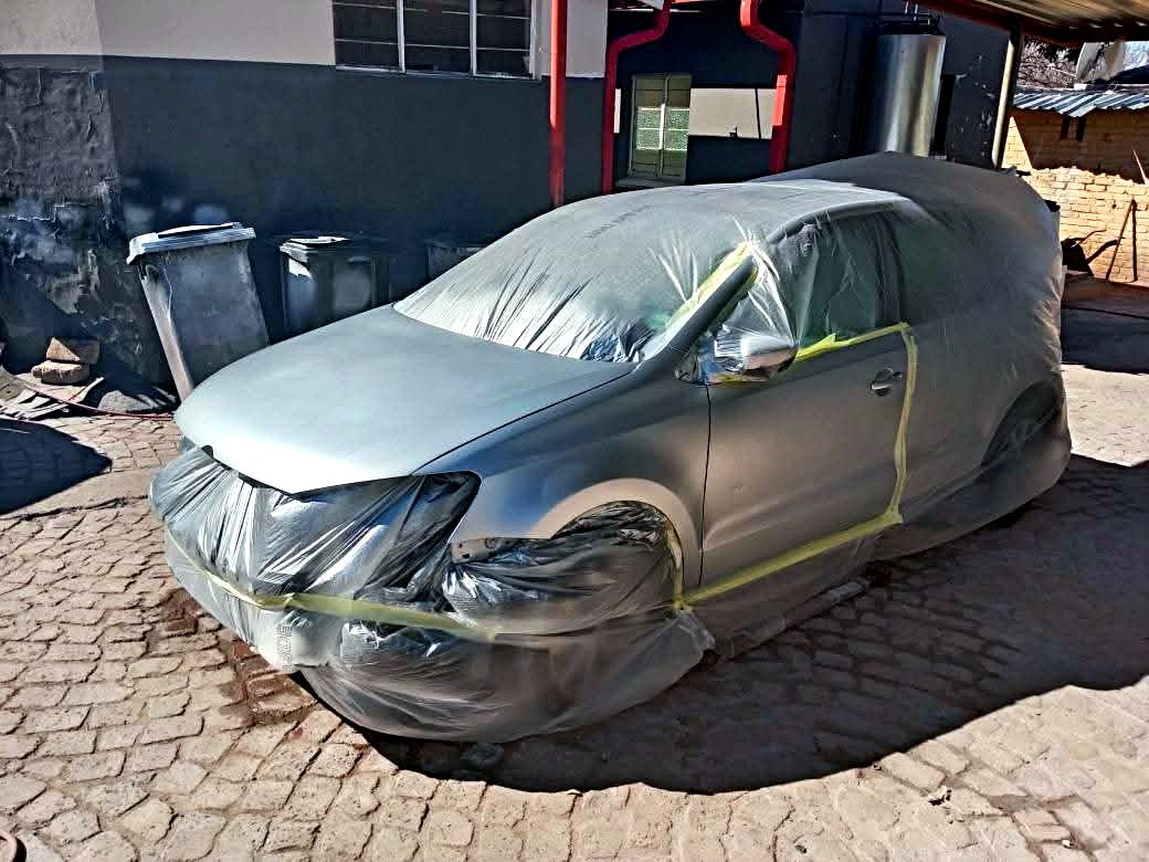 Vehicle masked and primed before respray