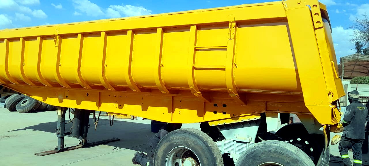 Completed yellow side-tipper trailer built by B & R Technical Services